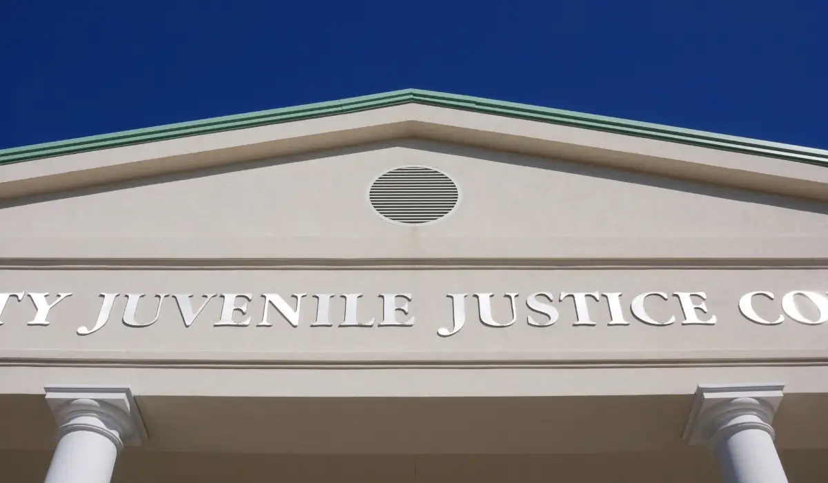 Front view of a Juvenile Justice Courthouse building in Naperville, representing how Juvenile Arrests are handled in the local court system.