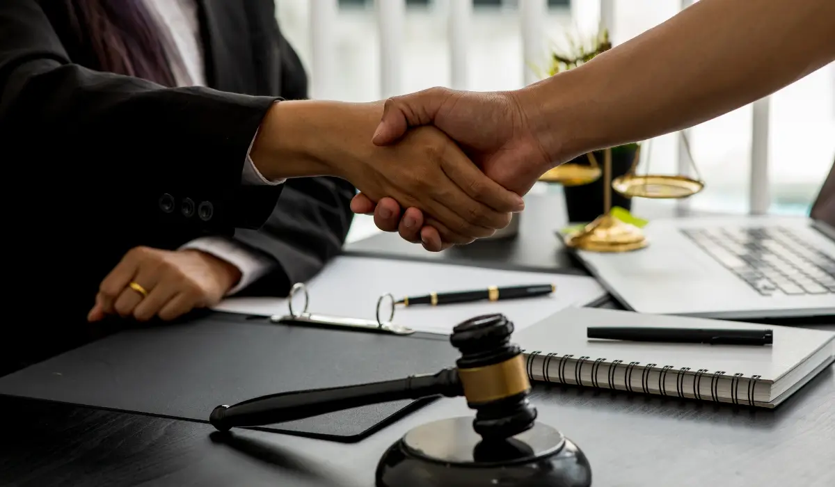 Criminal defense attorney meeting with client to provide burglary in Naperville legal defense and courtroom representation.